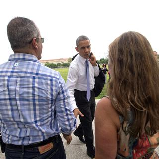 Le président américain surprend un couple de touristes à Washington. [AP Photo/Pablo Martinez Monsivais]