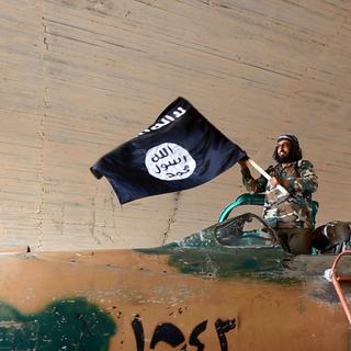 Les djihadistes de l'Etat islamique ont annoncé la décapitation d'un troisième otage. [AP Photo/Raqqa Media Center of the Islamic State group/Keystone]