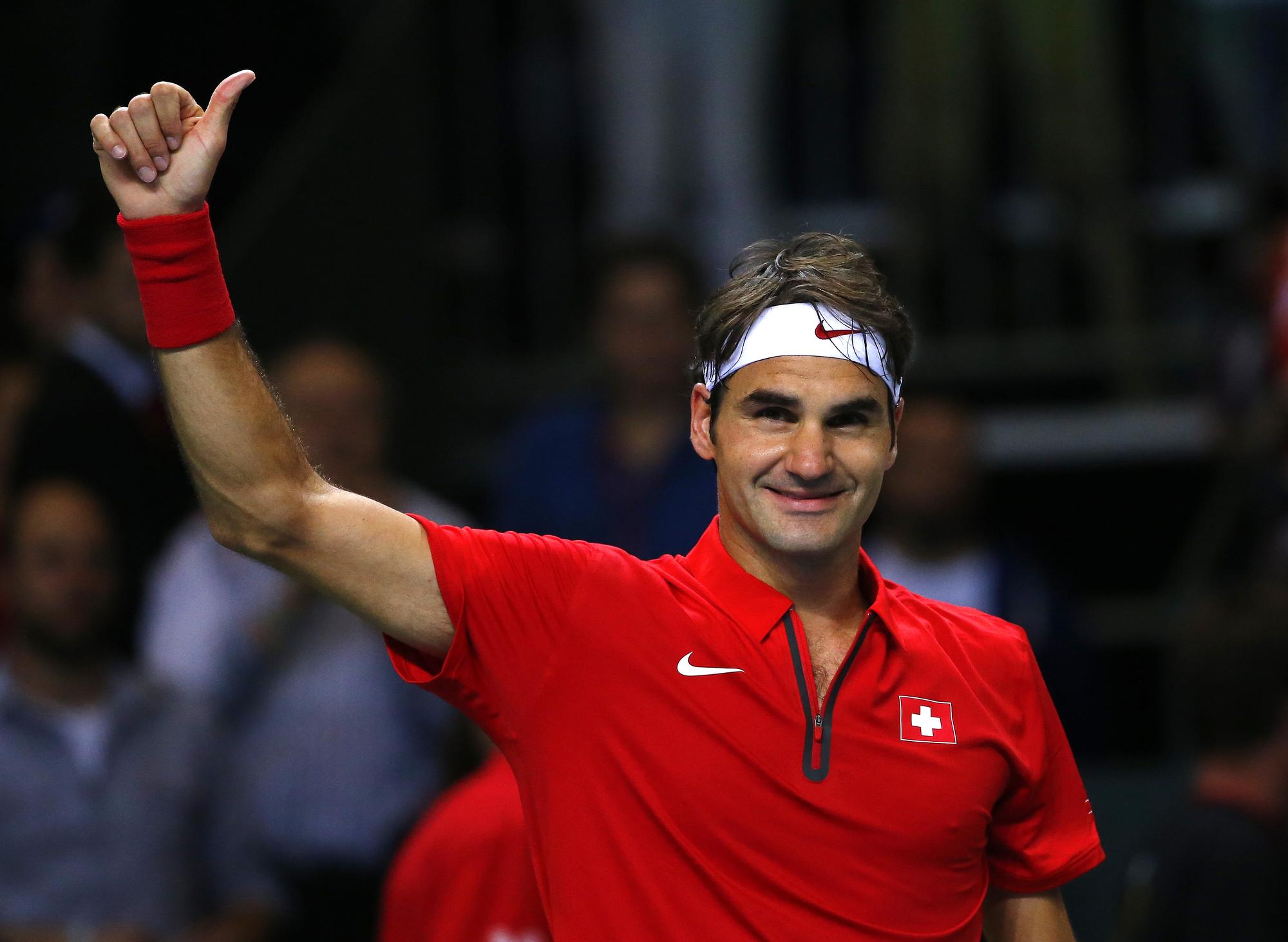 Federer et l'équipe de Suisse ont fait chaviré de bonheur le public de Palexpo. [REUTERS - Denis Balibouse]
