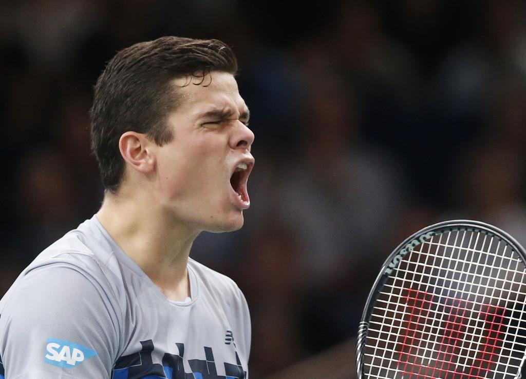 Raonic peut exulter. Il vient de battre le "Maître" pour la 1ère fois de sa carrière. [KEYSTONE - Michel Euler]