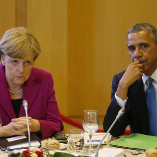 Angela Merkel et Barack Obama. [AP Photo/Charles Dharapak]