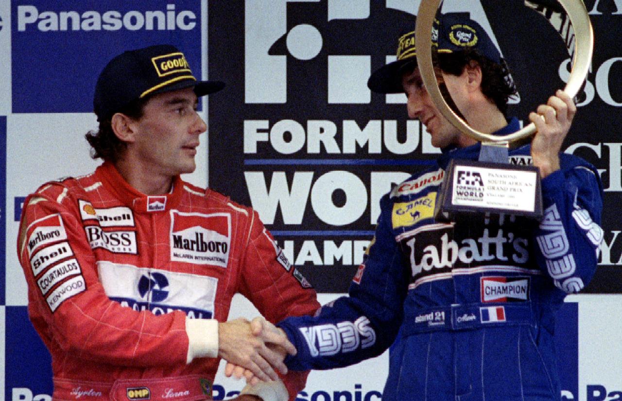 La F1 doit beaucoup à la rivalité légendaire entre Ayrton Senna (en rouge) et Alain Prost. [© Patrick de Noirmont / Reuters]