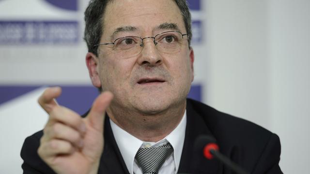 Yves Rossier, secrétaire d'Etat département fédéral des affaires étrangères (DFAE), lors d'une conférence de presse à Genève, le 17 décembre 2014. [Keystone - Martial Trezzini]