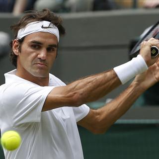 Federer a parfaitement réussi son entrée en matière à Wimbledon. [AP/Keystone - Pavel Golovkin]