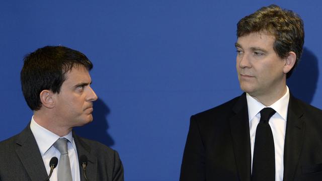 Ce week-end, Arnaud Montebourg (à droite) a violemment dénoncé la politique économique du gouvernement de Manuel Valls. [Philippe Desmazes]