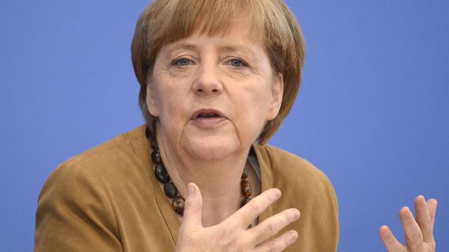 Angela Merkel se rendra en Ukraine samedi pour soutenir les autorités de Kiev. [AFP - Clemens Bilan]