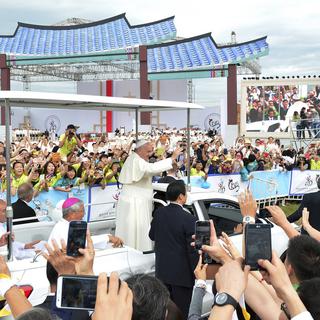 La visite du pape en Corée du Sud a suscité un vif engouement populaire et médiatique.