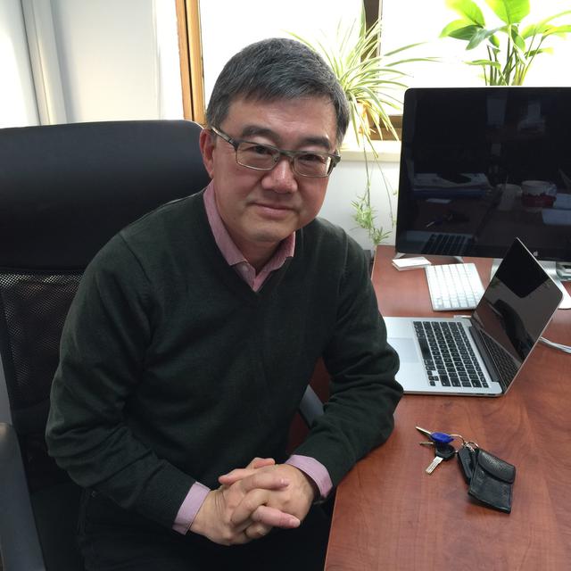 Wang Feng, sociologue et professeur à l’université de Shanghai (Fudan) et de Californie (Irvine). [RTS - DONG Cao]
