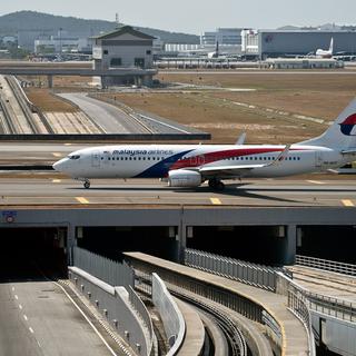 Un avion de la Malaysia Airlines. [AFP - Manan Vatsyayana]