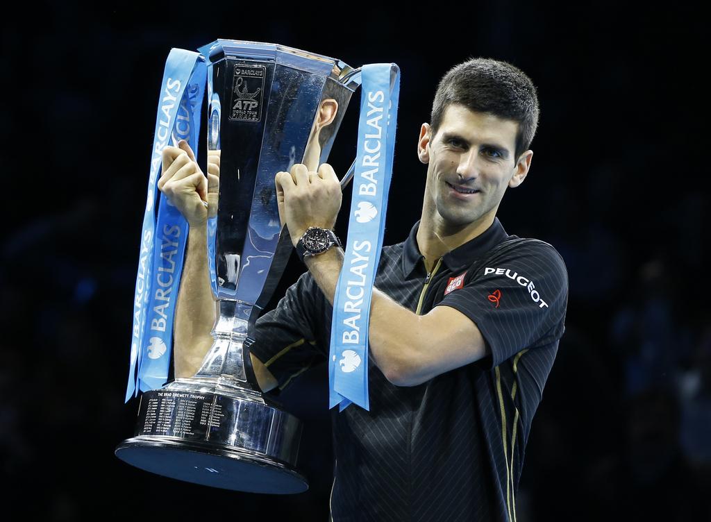 Assuré de rester no1 en fin d'année, Djokovic soulève son 4e "trophée des Maîtres". [KEYSTONE - Kirsty Wigglesworth]