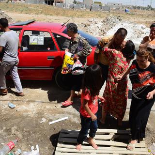 Cette famille chrétienne a fui Mossoul pour se réfugier à Erbil ce week-end.