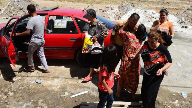 Cette famille chrétienne a fui Mossoul pour se réfugier à Erbil ce week-end.