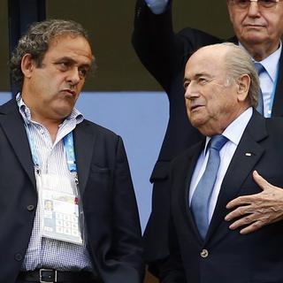 Platini (à gauche) a décidé de ne pas se lancer dans la course face à Sepp Blatter. [Darren Staples]