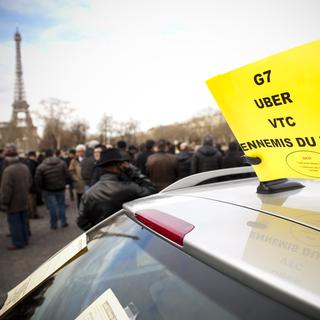 Uber pop a été violemment combattu par les chauffeurs de taxi de Paris pour concurrence déloyale. [Jaoued Idammou]
