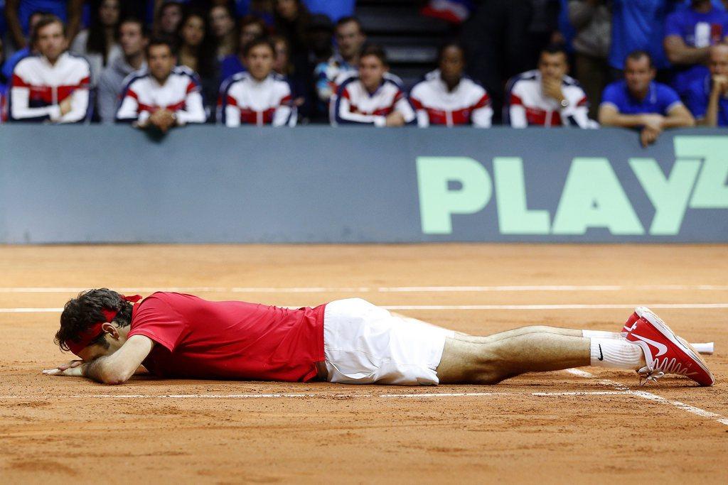 Cette image de Federer se passe de tout commentaire. [KEYSTONE - Yoan Valat]