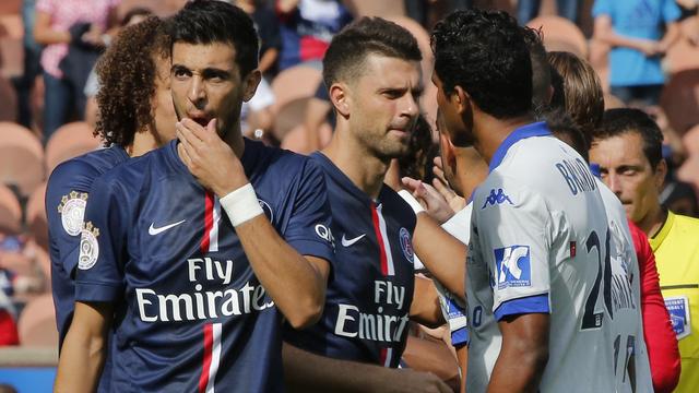 Brandao (à dr.) a donné un coup de tête à Motta (au centre) à la fin du match entre le PSG et Bastia.