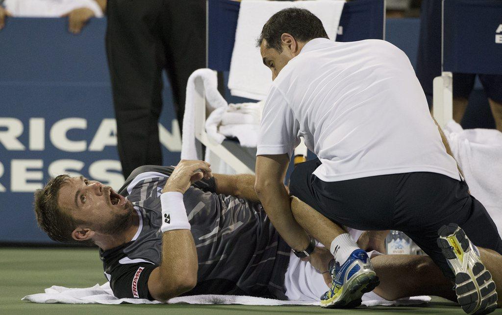 Wawrinka a fait appel au soigneur durant après le 9e jeu du 3e set. [KEYSTONE - Brian Hirschfeld]