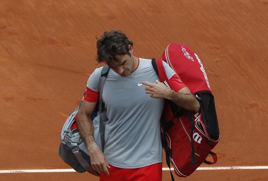 Federer a certainement manqué de repères sur l'ocre. [KEYSTONE - Michel Euler]