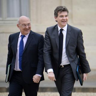 Les ministres français Michel Sapin (Finances) et Arnaud Montebourg (Economie et Industrie). [Lionel Bonaventure]