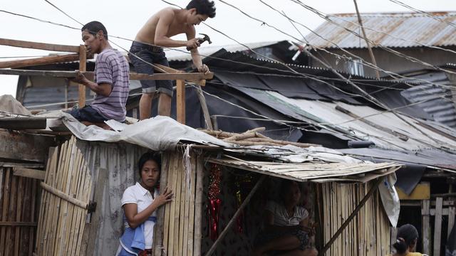 Des centaines d'habitations ont été détruites ou endommagées par le cyclone. [AP Photo/Keystone - Bullit Marquez]