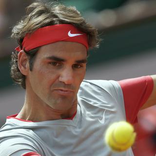 Roger Federer joue pour la 16e fois à la Porte d'Auteuil face au Slovaque Lukas Lacko. [AP/Keystone - Darko Vojinovic]