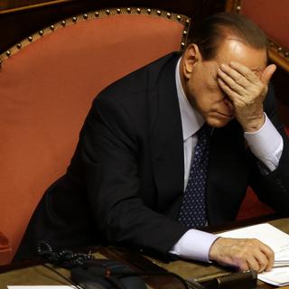 2 octobre 2013: Silvio Berlusconi est condamné pour fraude fiscale et doit rester en territoire italien. [Keystone - AP Photo/Gregorio Borgia]