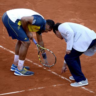 Le tournoi de Roland Garros se joue sur terre battue. [EPA/Keystone - Christophe Karaba]