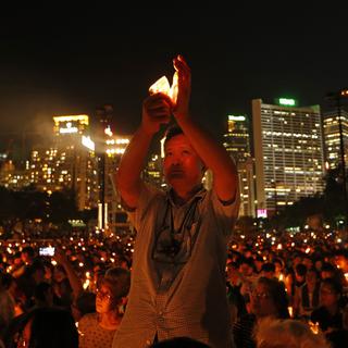 Commémoration, à Honk Kong, de la répression de Tiananmen. [AP Photo/Kin Cheung]