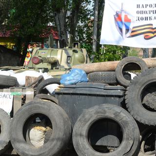 Un barrage des groupes en faveur d'une fédéralisation, dans une rue de Slaviansk. [RIA Novosti/AFP - Mikhail Voskresenskiy]