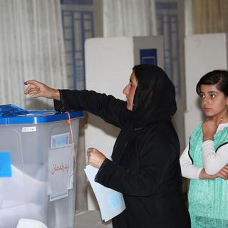 De longues files se sont formées mercredi à l'ouverture des bureaux de vote (ici, à Erbil.) [Anadolu Agency/AFP - Emrah Yorulmaz]