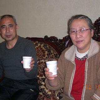 Hada photographié aux côtés de son épouse en 2010. [STR/AFP - China out]