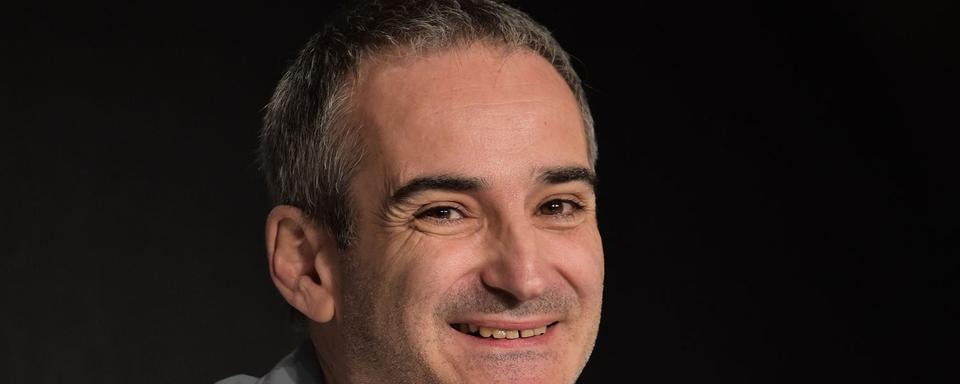 Le réalisateur français Olivier Assayas présente son nouveau film. [Bertrand Langlois]