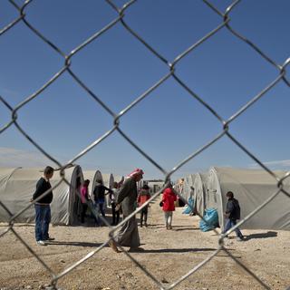 La majorité des réfugiés syriens ont été accueillis dans les pays voisins, ici un camp sur territoire turc. [AP Photo/Vadim Ghirda]