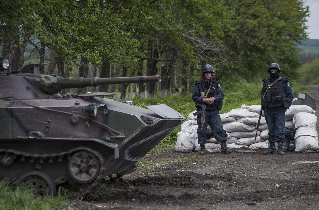L'opération militaire de l'armée ukrainienne dans l'est du pays a déjà fait des dizaines de victimes. [KEYSTONE - EPA/Roman Pilipey]