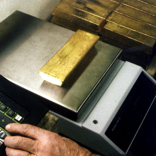L'initiative vise à conserver les réserves d'or dans les coffres de la BNS. [Str/Keystone]