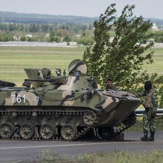 Le Kremlin sonne le rappel de ses troupes à la frontière ukrainienne. [EPA/ROMAN PILIPEY]