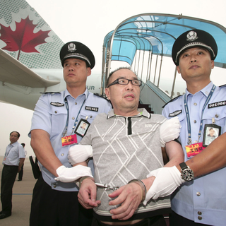 L'homme d’affaires Lai Changxing, extradé du Canada, avait été arrêté à son arrivée à Pékin. [Stringer]