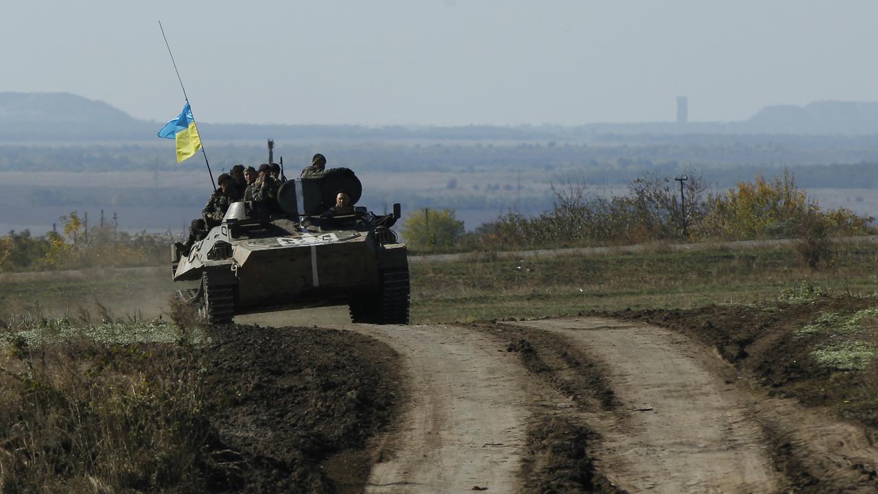 Un accord conclu entre les belligérants prévoit la création d'une zone échappant au contrôle de Kiev. [Reuters - David Mdzinarishvili]