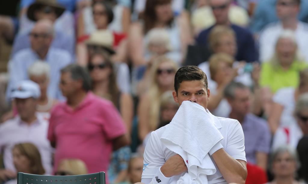 Raonic n'a pas vraiment existé face à Federer. [KEYSTONE - PAVEL GOLOVKIN Pavel Golovkin]