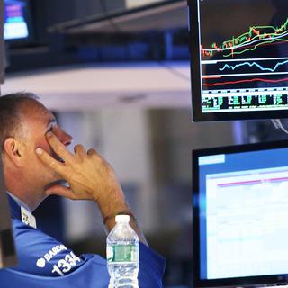 Des indicateurs américains jugés décevants ont fait chuté les places boursières mercredi. [Spencer Platt/Getty Images/AFP]