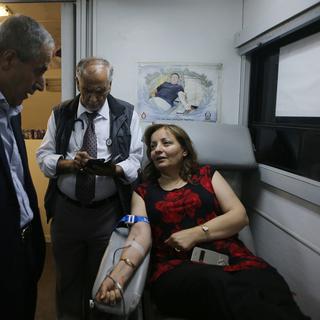 Don du sang à Amman en faveur des Palestiniens blessé dans le conflit avec Israël. [Anadolu Agency/AFP - Salah Malkawi]
