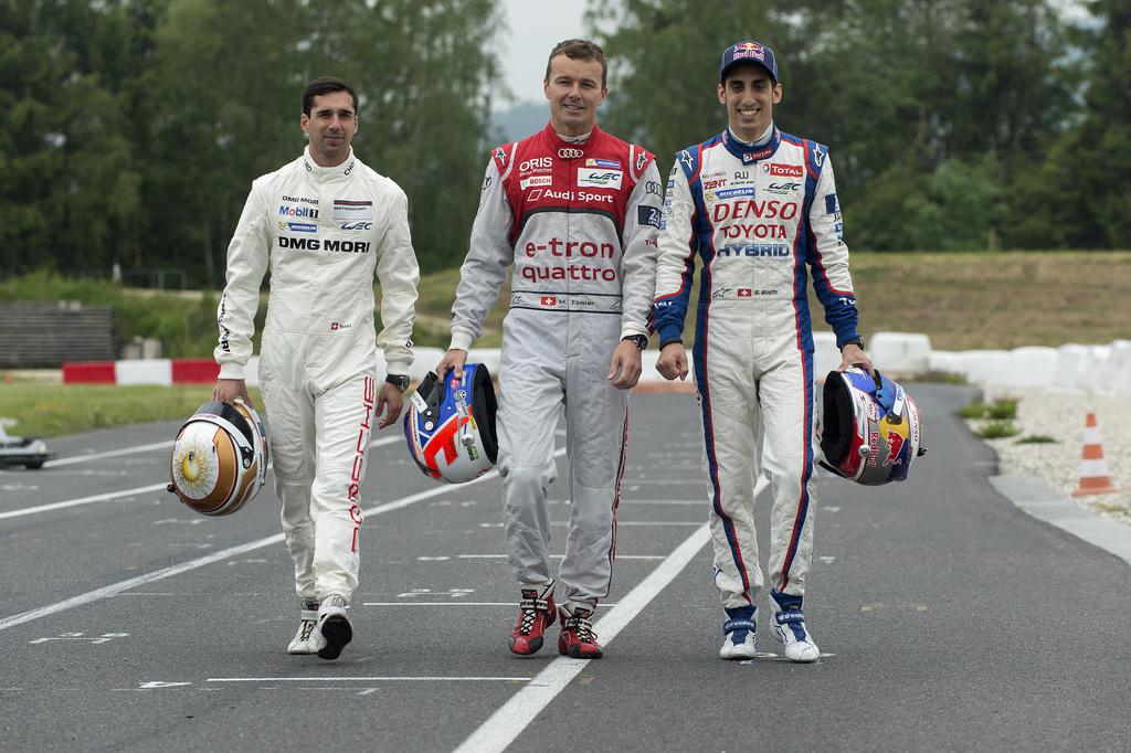 Neel Jani, Marcel Fässler et Sébastien Buemi (de gauche à droite) à Lignières, seul circuit en Suisse. [Sandro Campardo]
