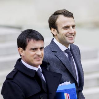 Manuel Valls et Emmanuel Macron. [AFP - Aurélien Morissard]