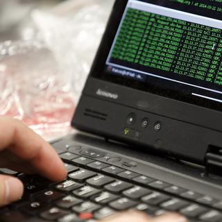 Le piratage informatique est puni pénalement en Suisse. [Salvatore Di Nolfi]
