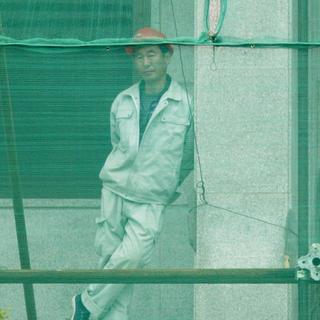 Ouvrier nord-coréen sur un chantier. [Kim Kyung-hoon]