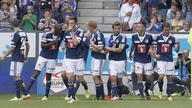 Les Lucernois jubilent. Vainqueurs de Thoune, ils s'offrent un billet pour l'Europa League. [Sigi Tischler]