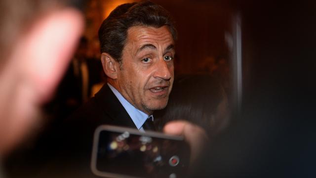 L'ancien président français Nicolas Sarkozy a été placé en garde à vue le 1er juillet 2014. Depuis avril 2013, la justice enquête sur un éventuel financement libyen de sa campagne présidentielle de 2007. Des écoutes téléphoniques ont éveillé des soupçons de trafic d'influence et violation du secret de l'instruction. Les enquêteurs cherchent désormais à savoir si l'ex-chef d'Etat a cherché à obtenir des informations sur le dossier Bettencourt auprès d'un magistrat de haut rang, en échange de la promesse d'un poste de prestige. [AFP - Emmanuel Dunand]