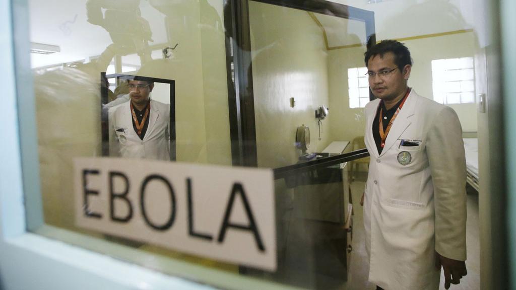 La recherche sur Ebola se fait-elle au détriment d'autres maladies ou pandémies plus meurtrières? [AP/Keystone - Bullit Marquez]