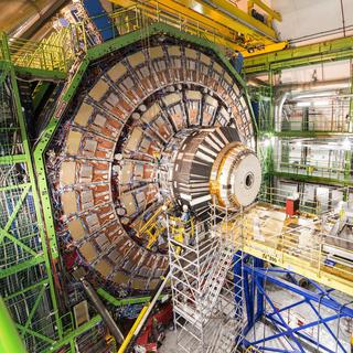 Avec ses 27 kilomètres de tunnel, le LHC, situé sur la frontière franco-suisse, est le plus grand accélérateur de particules du monde. [Keystone]