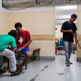 Requérants érythréens au centre de Lumino (TI), juillet 2014. [Gabriele Putzu/Ti-Press]